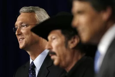 From left: 2006 Democratic gubernatorial candidate Chris Bell, independent candidate Kinky Friedman and Gov. Rick Perry participate in a debate in Dallas.
